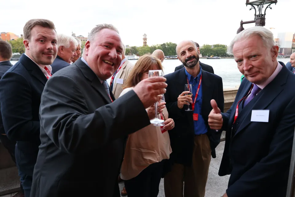 Guests raise a toast on the River Terrace